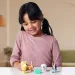 Bluey: Füge das 4er-Spielzeugfiguren-Set dem Paket hinzu.