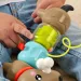 Fisher-Price: Kleine Lieblinge Beschäftigung Dackel - Mattel