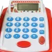 Weiß-rote elektronische Registrierkasse mit Geräuschen, Produkten und Spielgeld 25x10x14cm